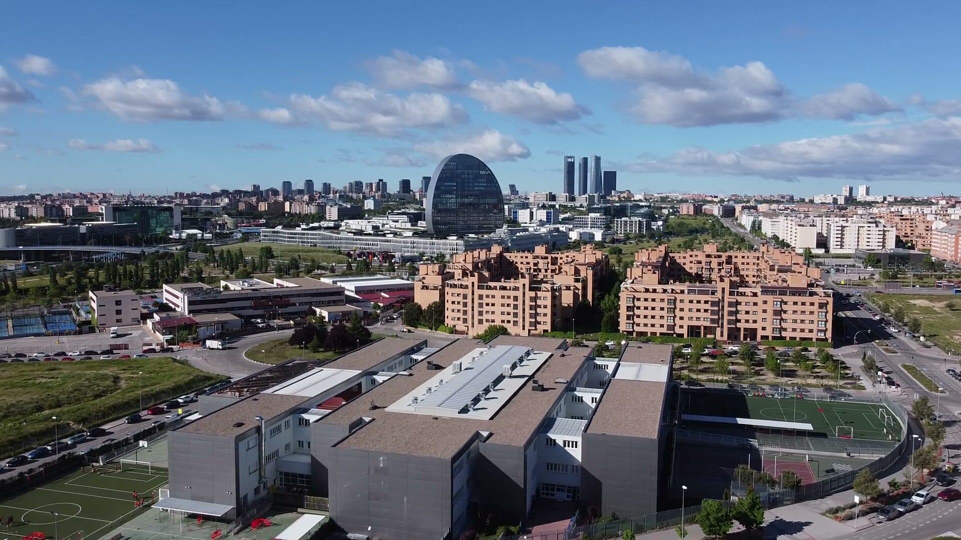 Aerial view of Madrid with the Cuatro Torres business district on the skyline.
